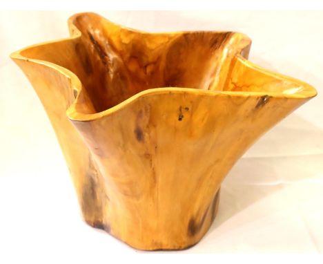 A large carved yew planter formed from a single trunk, D: 45 cm. Not available for in-house P&amp;P, contact Paul O'Hea at Ma