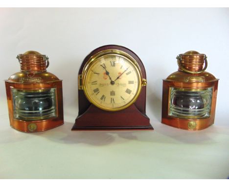 A good quality marine bulkhead time piece by Sewills on a timber bracket (electric movement) together with two copper lantern