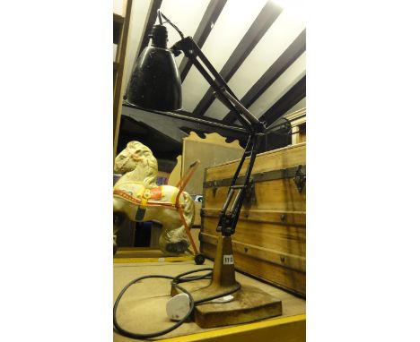 A vintage industrial anglepoise twin arm table lamp with heavy cast metal base 
