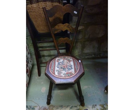 An Edwardian folding steamer/garden chair with cane panelled seat, a further small oak stool with cane panelled seat and a sp