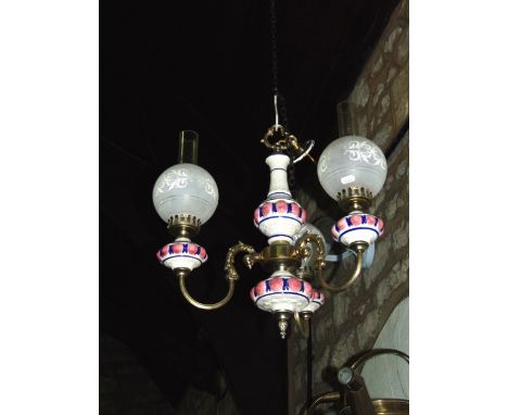 A ceramic and brass three branch ceiling light in the Victorian style with etched glass shades 