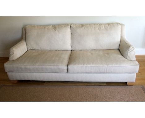 A Wesley Barrell four seater sofa the Hensington model, the fabric by Robert Allen, Orvis-Alabaster with natural legs, 2 metr