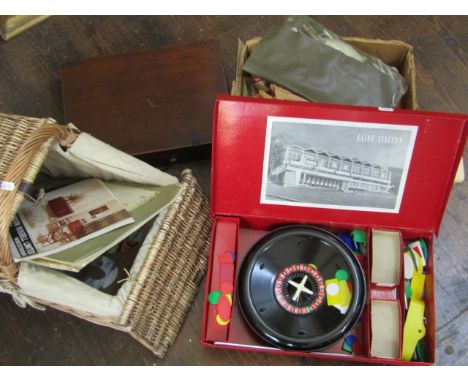 A collection of artists materials including a mahogany paint box containing palette, various sketch books, a large unframed e