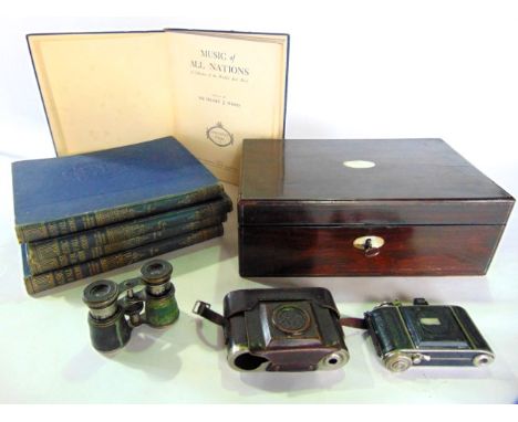 A 19th century rosewood writing desk with mother of pearl inlaid detail, a small pair of vintage binoculars, a vintage Baldin