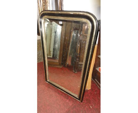 A vintage French wall mirror, with moulded partly ebonised arch frame, 117cm x 75cm approx 