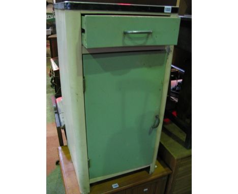 A vintage painted aluminium kitchen cupboard enclosed by a door beneath a drawer and enamelled top