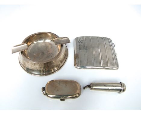 A mixed collection of Edwardian and later silver items to include a circular silver ashtray, a silver engine turned cigarette