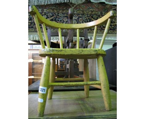 A child's Windsor elm and beechwood stick back child's chair with later painted finish