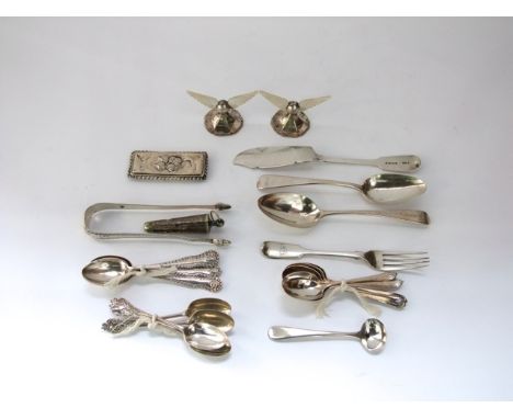 A mixed collection of Victorian and later silver items to include two dessert spoons, a salt spoon, 14 teaspoons, a pair of s