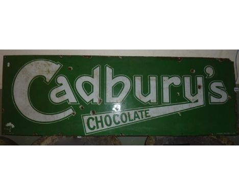 A vintage enamel sign of rectangular form advertising Cadbury's Chocolate, with mint green ground and white lettering