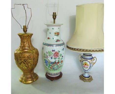 Three table lamps including a Noritake porcelain urn shaped vase with hand painted floral detail, a gilded plaster vase shape