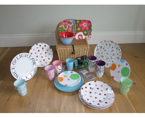 A double ended wicker picnic hamper containing a quantity of melamine picnic wares including Emma Bridgewater beakers inscrib