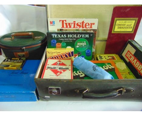 A selection of vintage board games to include Twister, Scrabble, Backgammon, Trivial Pursuit, a boxed timber chess set, etc