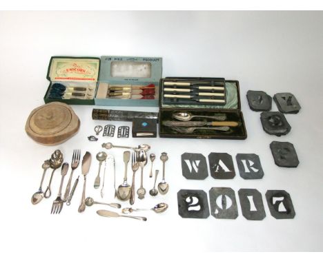 A collection of silver plated flatware including a late 19th century cased spoon, fork and knife set, further boxed knives, a