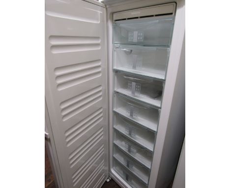 A Liebherr deep freeze cabinet of full height model number 7082668-04 containing eight shelves, 185cm high