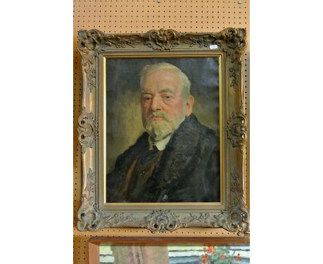 An early 20th century oil painting on canvas by Reginald Grenville Eves of a bust length portrait of a bearded man in fur col