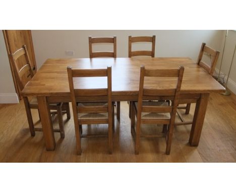 A fired earth bastide oak refectory table in warm oak with parquetry top raised on four square chamfered supports together wi