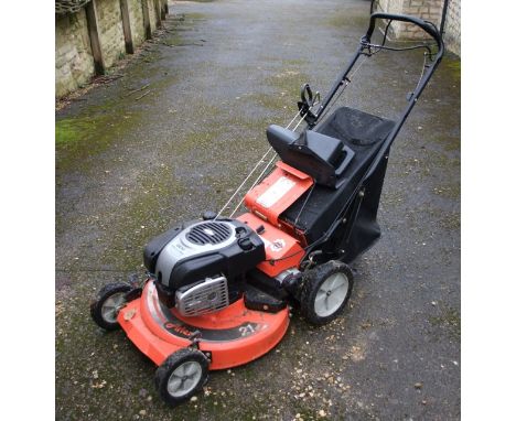 An Arliens walk behind lawn mower with a Dov Briggs & Stratton ready start engine, 21 inch cut, model number 911339-LM21S