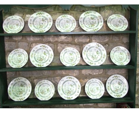 A quantity of Royal Doulton Tonkin pattern dinner wares number TC1107 comprising three oval serving dishes, seven dinner plat