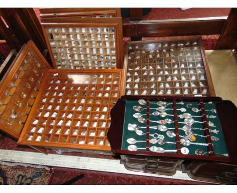 A large collection (approx 1000 in eleven cabinets) of collectors thimbles, mainly ceramic, together with a collection of sil