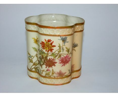 A Royal Worcester blush ivory cachepot of quatrefoil shaped form with painted and gilded chrysanthemum decoration and puce pr