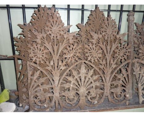 Eight sections of 19th century ornamental ironwork railing with pierced foliate detail, each section approximately 70 cm wide