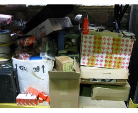 A large quantity of mainly unused electrical related wares including wall sockets, plugs, cabling, a large assortment of ligh