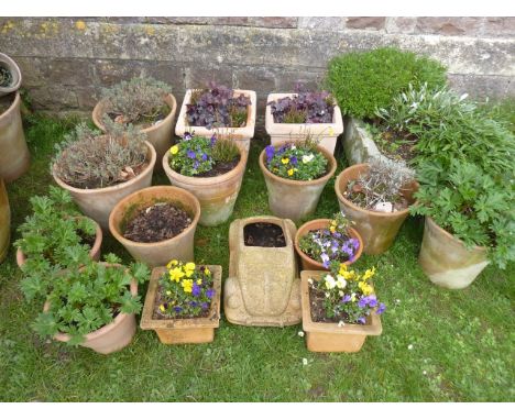 One lot of small weathered contemporary garden planters of varying design, including pairs (mainly planted), together with a 