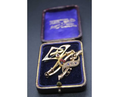 An Edwardian 9ct gold, sapphire and diamond set bar brooch; together with two other 9ct gold bar brooches of the period, two 