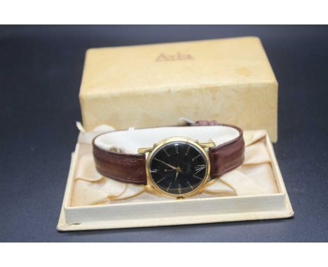 An Avia gent's steel and gilt metal cased manual wind wristwatch, circa 1958, case dia.33mm, in original box 