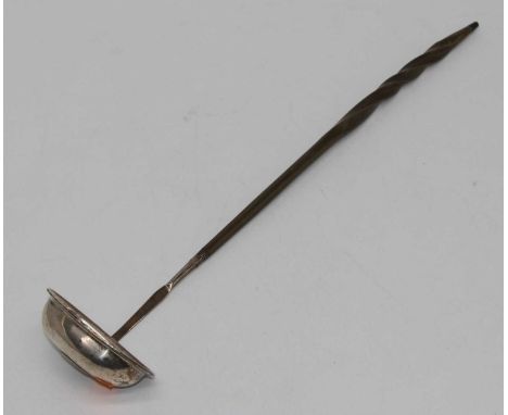 A George III silver toddy ladle, having a twisted whalebone handle, the bowl inset with a coin