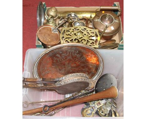 A collection of metal ware to include copper saucepan, shell case, and a powder flask