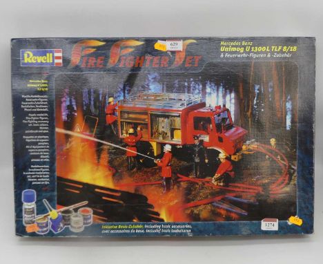 A boxed Revell 1/24 scale plastic kit for Mercedes Benz Unimog U1300L fire tender with action figures and paints included