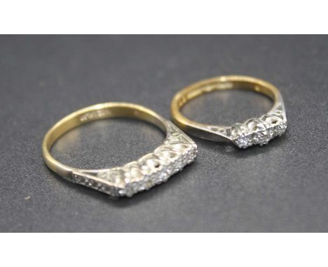 An 18ct gold and platinum diamond three stone ring, size K; together with an 18ct gold diamond five stone ring, size S, gross