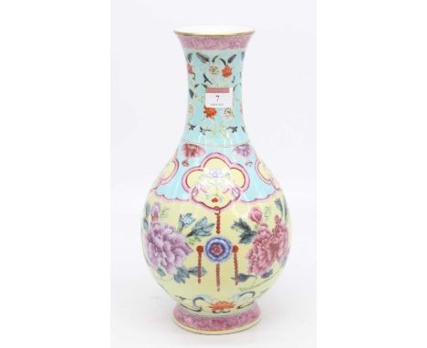 A 20th century Chinese porcelain vase, enamel decorated with chrysanthemums, seal mark to the underside, height 34cm