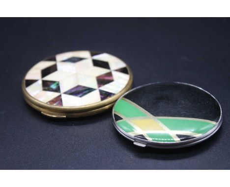 An Art Deco chrome and enamel lady's powder compact; together with a later engine turned and mother of pearl set example (2)