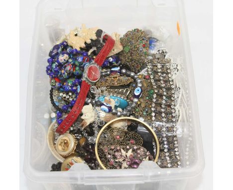 A box of miscellaneous costume jewellery to include a paste set bangle, filigree pendant, ladies wristwatch etc