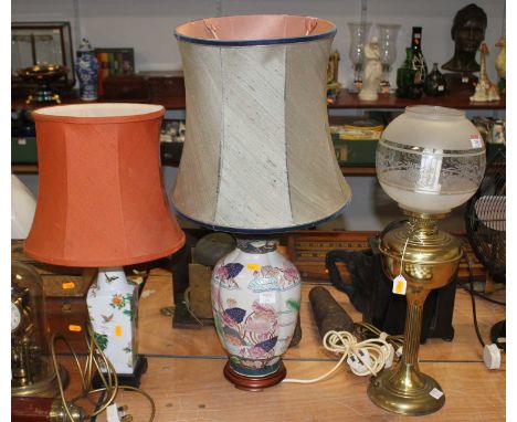 A brass oil lamp, converted for electricity, having acid etched glass shade, height 59cm, together with two 20th century Chin