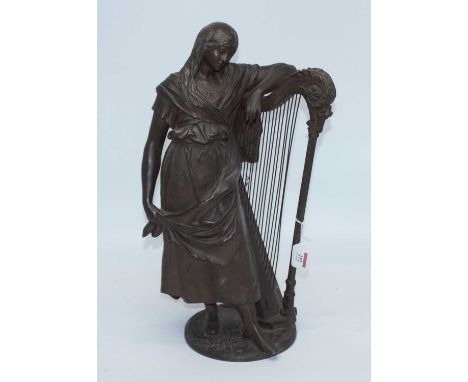 A bronzed metal figure of a lady beside a harp, signed Auguste Moreau to the base, height 53cm