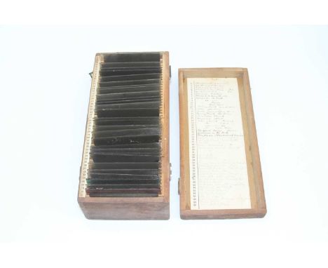 A collection of magic lantern slides, cased