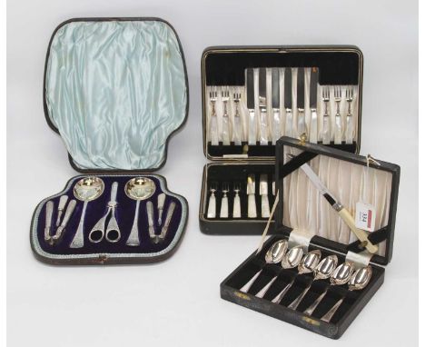 A set of twelve mid 20th century silver plated dessert knives and forks, each with mother of pearl handles in fitted case, to