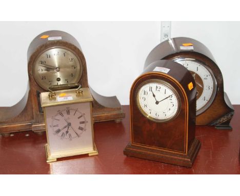 An Edwardian mahogany cased mantel clock, the enamel dial showing Arabic numerals 21cm, together with three other clocks