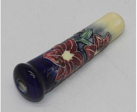 A C20th light pull handle on a mottled cream ground with floral decoration 10cm