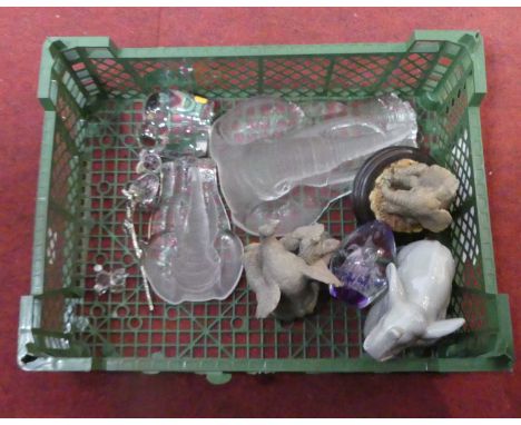 A collection of elephants of various sizes to include ceramic and porcelain examples, Royal Doulton, Tuskas and crystal 