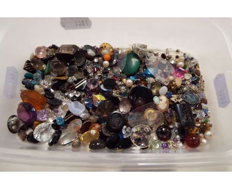 A selection of assorted loose stones to include opal, paste, rhinestones, intaglios etc