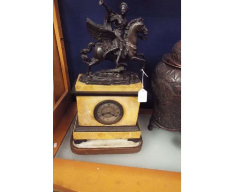 A H.R DE S.S.R. N. LE D' ORLEANS PALAIS ROYAL mantle clock, a bronzed figure riding a Pegasus  mounted on a butterscotch marb