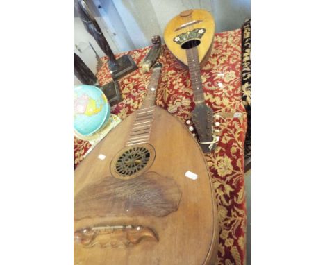 A balalaika and mandolin in need of restoration