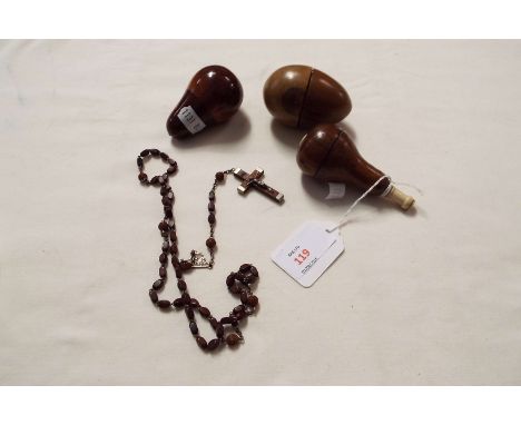 An olive wood egg with cotton reel, wooden pear and pear shaped wooden light pull with ivory fittings