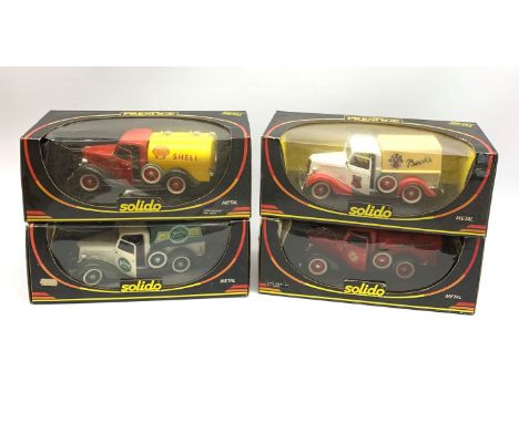 Four Solido Prestige die-cast models of Ford Pick-Up trucks with various liveries, all boxed (4) - Condition Report 