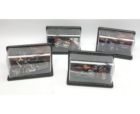 Three Franklin Mint die-cast models of Harley Davidson motorcycles comprising 1948 Panhead and Electra Glide, both boxed, and